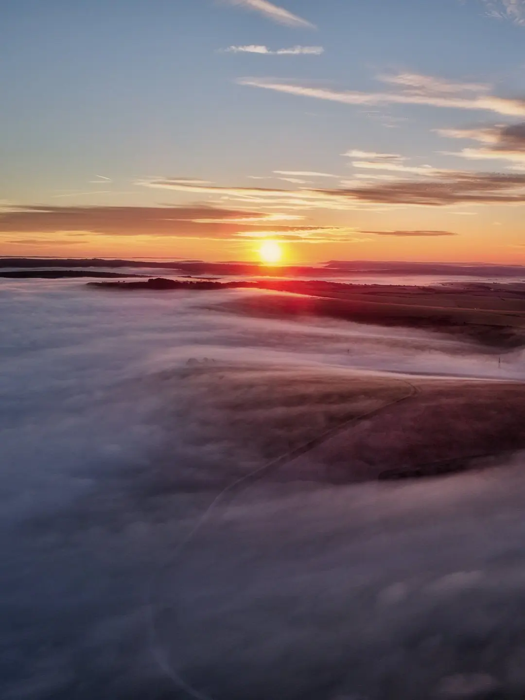 Cloud filling the valley below the Downs at dawn